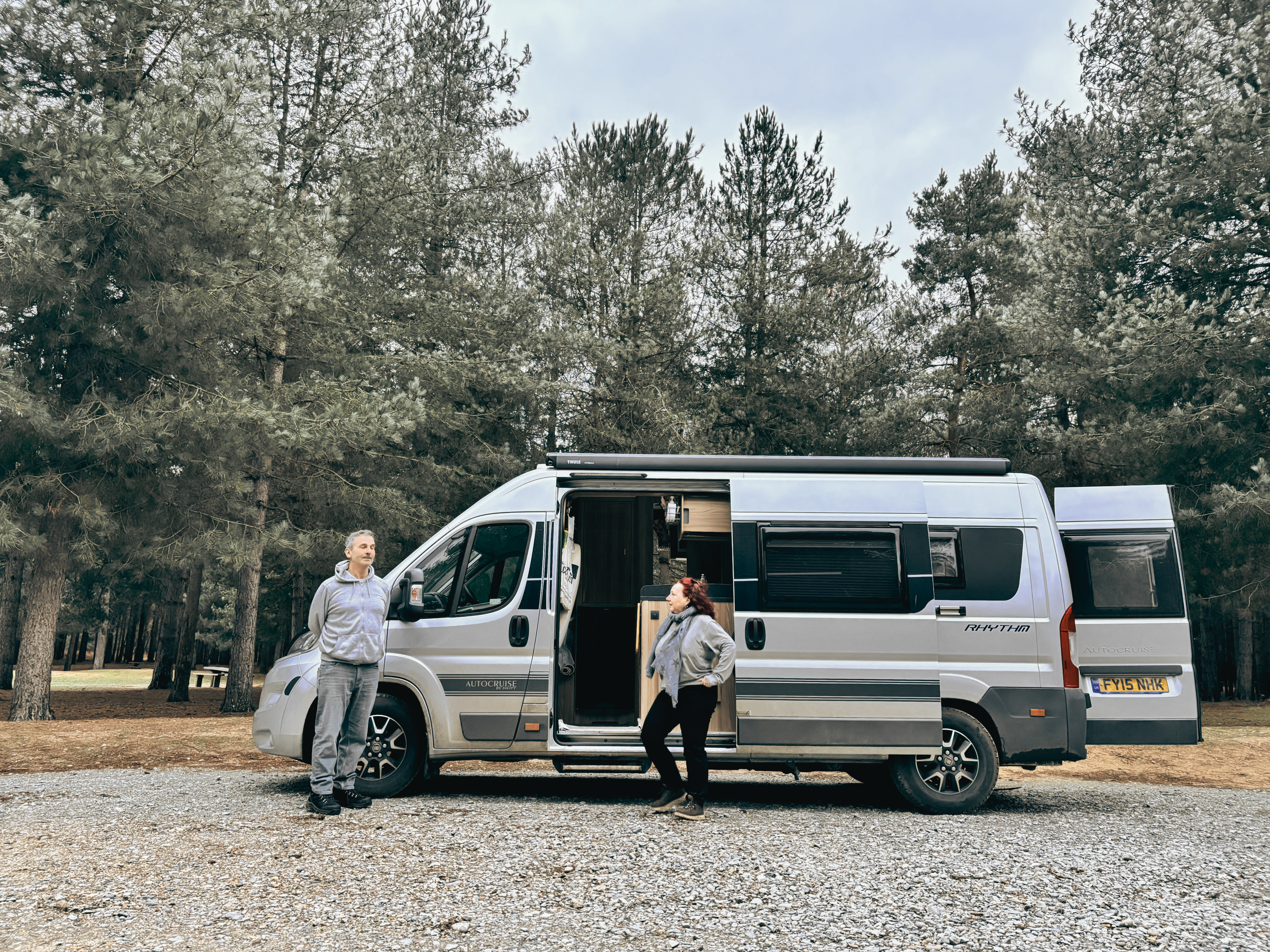 Angela and Alan beside their campervan Gio